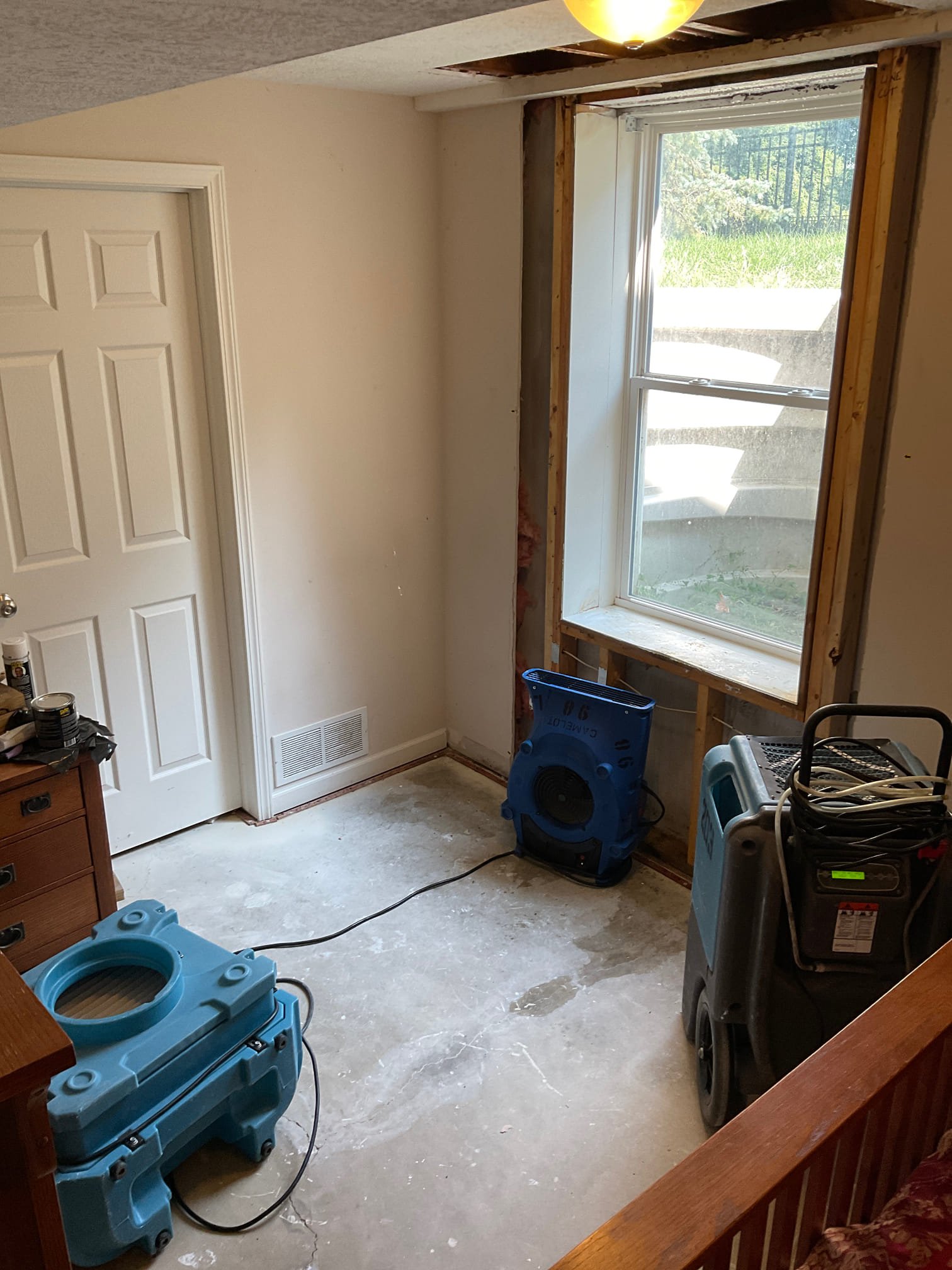 Drying out of basement window after water supply line leak 
