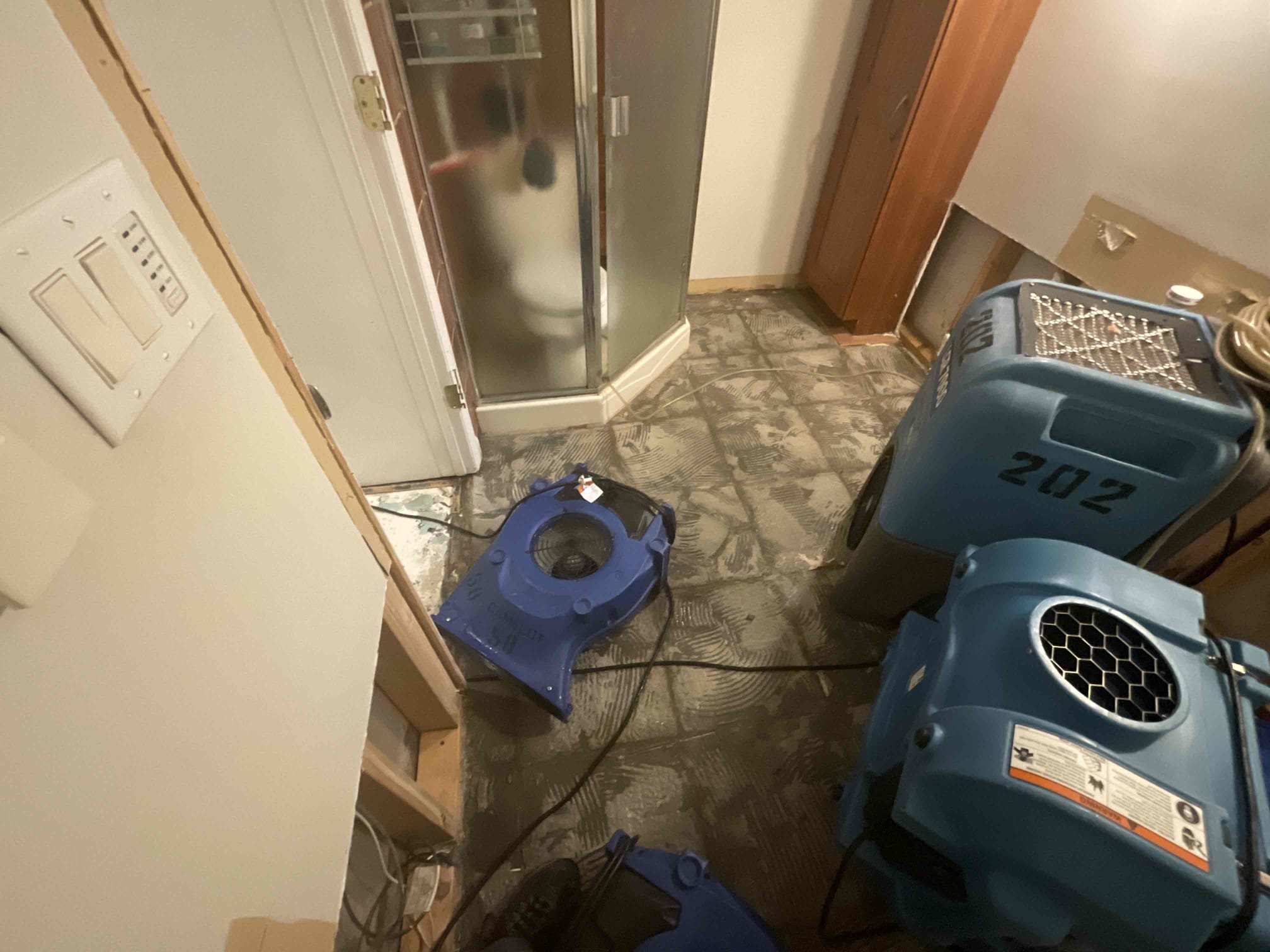 Drying out of bathroom after sewage backup